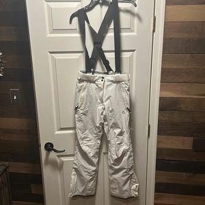 Ski pants with adjustable waist and removable overalls
